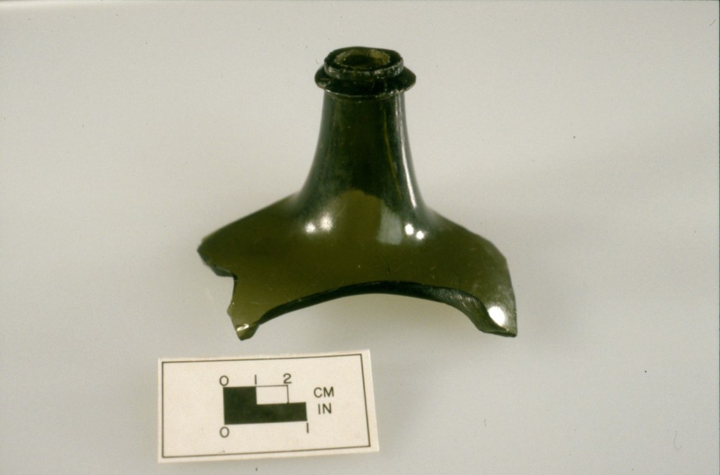 Top of an 18th century hand-blown glass bottle
